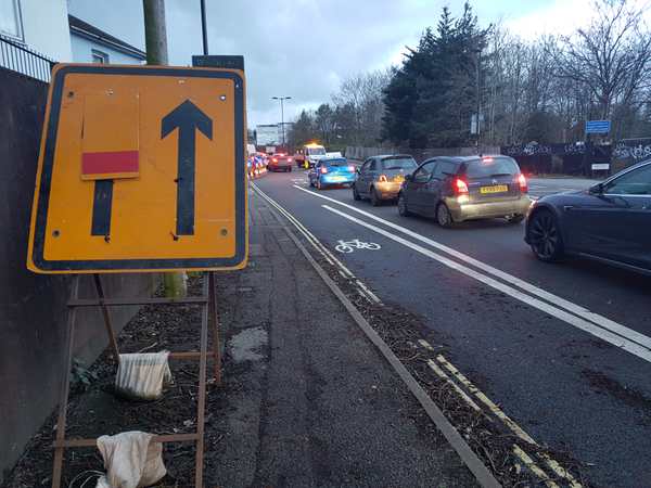 lane closed with cars queueing 20240327 182754