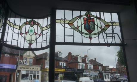 old chemist windows looking out